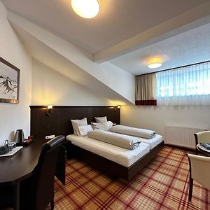 Kamer met een Queen Size Bed